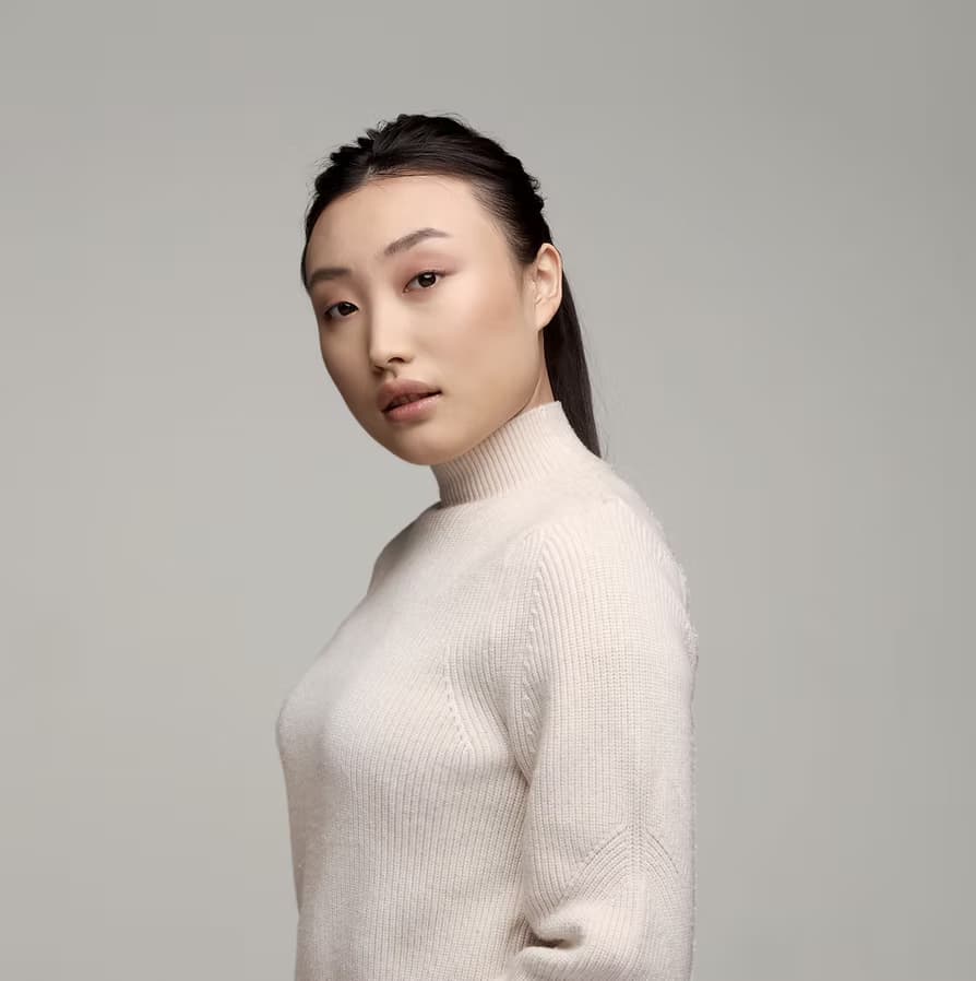 Woman in a white sweater